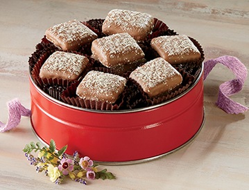 Butter Toffee Tin of chocolate-coated Handcrafted Butter Toffee with a red bow
