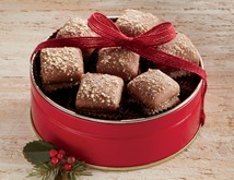 Butter Toffee Tin of chocolate-coated Handcrafted Butter Toffee with a red bow